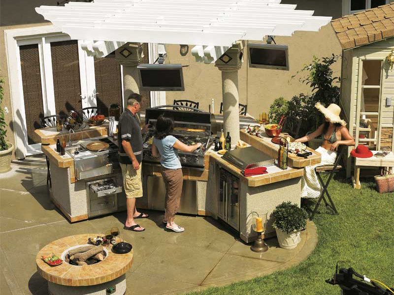 Photo courtesy Cal Spas Outdoor kitchens help keep the entertainment in the backyard