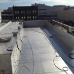 Fitting the stainless steel pool walls and floor.