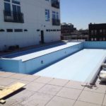 Installation progresses quickly and the pool deck is finished.
