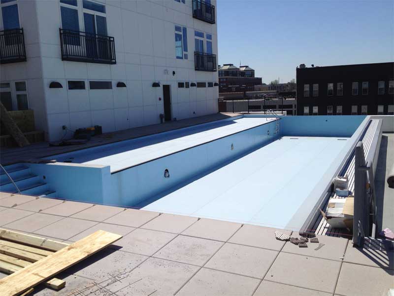 Installation progresses quickly and the pool deck is finished.