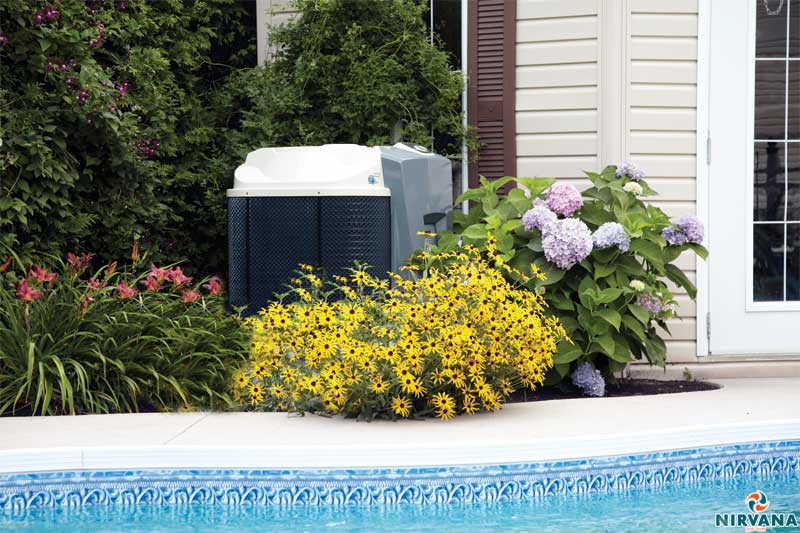 Photo courtesy Nirvana Heat Pumps Inc. A heat pump should be installed as far away as possible from walls and fences