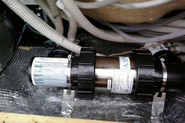 Photo courtesy Health Canada Delta UV model EA-4H-5 ultraviolet generator, installed in a hot tub’s cabinet interior