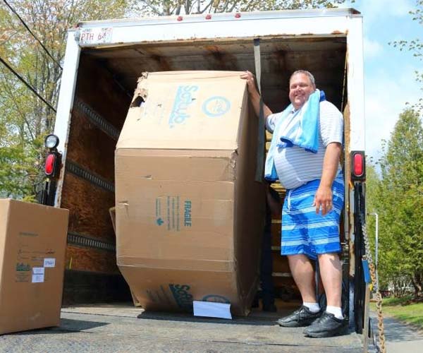 Photo courtesy Softub Canada Softub dealer Bay Tubs in Mahone Bay, NS, delivered the free hot tub to Paul Crowdis (pictured) and Colin Friars.