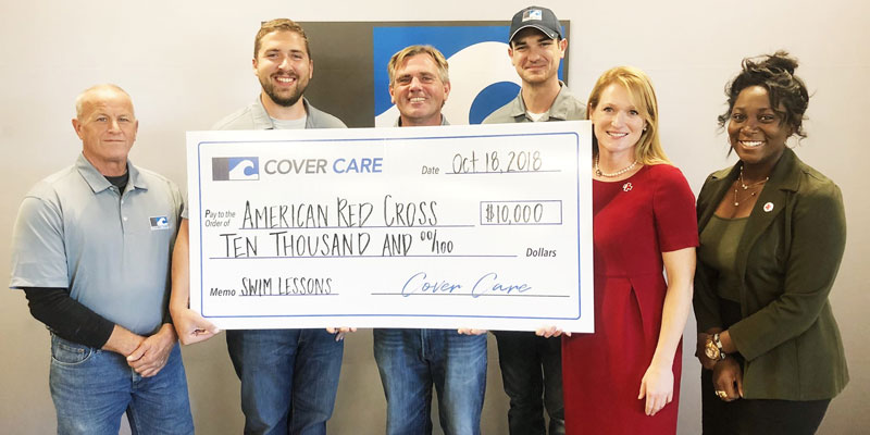 Photo courtesy Cover Care LLC Cover Care’s Dean Mikels, Jared Pepmeier, Darren Cardwell, and Mitch Valdez present the company’s donation to Kate Hayward and Duchess Adjei of the American Red Cross.