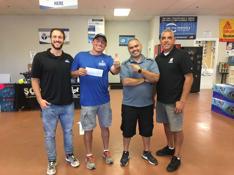 Photos courtesy NC Brands From left: Nick Gordon, NC Brands; first-place winner Tony Lawrence, TLC Pools; Jr., branch manager at Superior Pool Products El Cajon; and Gustavo, assistant branch manager at Superior Pool Products El Cajon.