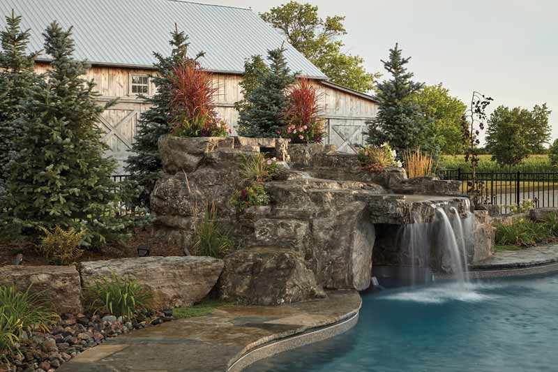 Designed as the project’s focal point, the waterfall is visible from the home’s interior, as well as from the outdoor living area.