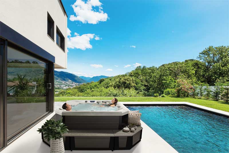 Photos courtesy Marquis® Corp. This five-person hot tub is equipped with a full surround in a ‘barn wood’ colour.