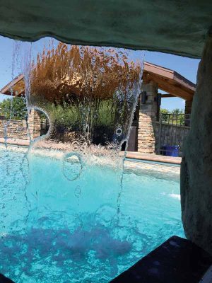 Photo courtesy Bob's Pools In addition to being esthetically pleasing, grottos and caves are also fun.