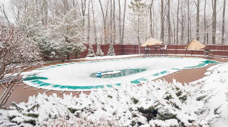 Photo courtesy Terry Arko A sump pump should be employed to vacate any water accumulation on pools using a solid cover.