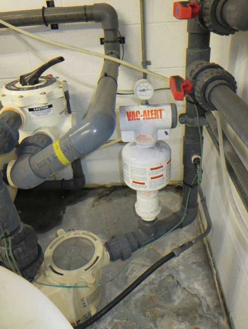 Photos courtesy Toronto Public Health (TPH) Vacuum release mechanism installed before the pump on the pipe that brings back water from the pool. If vacuum is detected, this safety mechanism is designed to allow air into the pipe and release the vacuum to prevent injury.