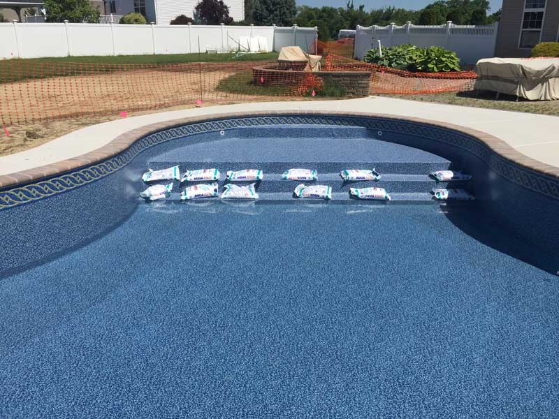 Photo courtesy AquaForms Vinyl-liner pools built with concrete walls can now support designs that include many features which, in the past, were typically associated only with custom gunite or shotcrete structures.